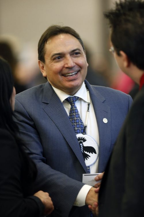 WAYNE GLOWACKI / WINNIPEG FREE PRESS   In centre, Perry Bellegarde, National Chief Assembly of First Nations meets with guests attending Manitoba Chambers of Commerce luncheon Friday. Perry was the keynote speaker at the event. Bill Redekop March 11 2016