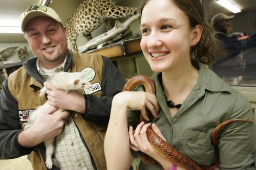 John Woods / Winnipeg Free Press / February 25, 2008 - 080225  - Trevor Alexander and Sheila Gouriluk are volunteers at the Assiniboine Zoo educational centre.  The couple posed for a photograph holding a Hobo the ferret and Alan the corn snake Monday February 25, 2008.