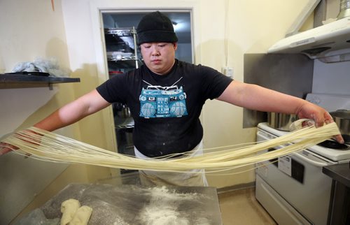 TREVOR HAGAN / WINNIPEG FREE PRESS Restaurant Review - Dancing Noodle. Chef Xiaofei Zuo makes noodles by hand and to order, Saturday, March 12, 2016. - FOR BART KIVES REVIEW