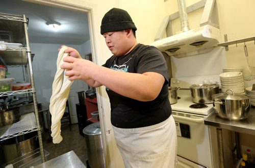 TREVOR HAGAN / WINNIPEG FREE PRESS Restaurant Review - Dancing Noodle. Chef Xiaofei Zuo makes noodles by hand and to order, Saturday, March 12, 2016. - FOR BART KIVES REVIEW