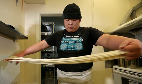 TREVOR HAGAN / WINNIPEG FREE PRESS Restaurant Review - Dancing Noodle. Chef Xiaofei Zuo makes noodles by hand and to order, Saturday, March 12, 2016. - FOR BART KIVES REVIEW