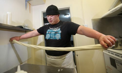 TREVOR HAGAN / WINNIPEG FREE PRESS Restaurant Review - Dancing Noodle. Chef Xiaofei Zuo makes noodles by hand and to order, Saturday, March 12, 2016. - FOR BART KIVES REVIEW