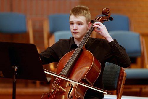 TREVOR HAGAN / WINNIPEG FREE PRESS Josh Orriss, 16, a member of Four-Te, a string chamber group, performing at Young United Church during the Winnipeg Music Festival, Friday, March 11, 2016.