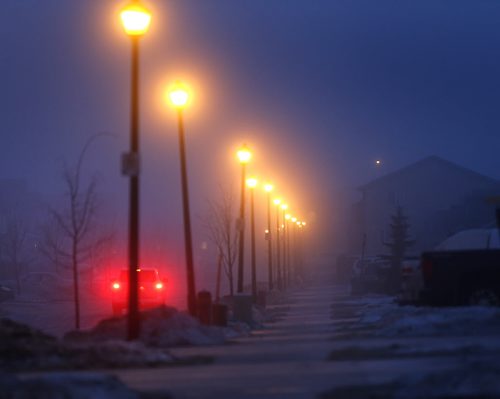 WAYNE GLOWACKI / WINNIPEG FREE PRESS   It was a foggy start Monday, the morning temperature near 0C  iced sidewalks and side streets causing several collisions. This view is down Tommy Douglas Dr. in Transcona. March 13 2016