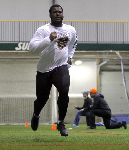 BORIS MINKEVICH / WINNIPEG FREE PRESS Bison David Onyemata pro day football workout at the University of Manitoba. Onyemata is the first Manitoba Bisons to hold a pro day football workout.  At least 12-16 NFL scouts and coaches were there. Photo taken March 14, 2016