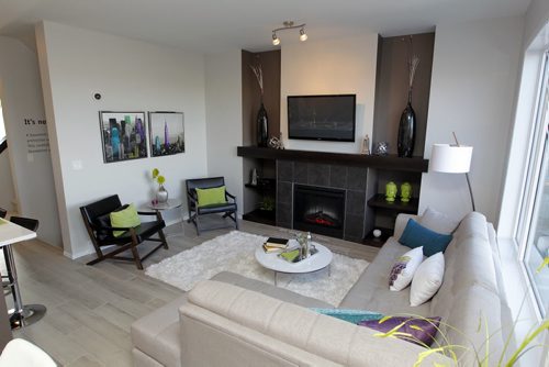 BORIS MINKEVICH / WINNIPEG FREE PRESS 140 Larry Vickar Drive West in Devonshire Village A & S Homes. Living area. Photo taken March 14, 2016