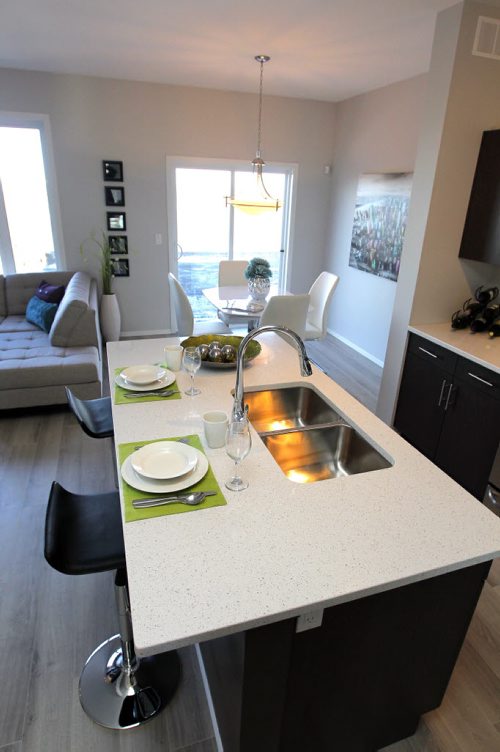 BORIS MINKEVICH / WINNIPEG FREE PRESS 140 Larry Vickar Drive West in Devonshire Village A & S Homes. Kitchen island. Photo taken March 14, 2016