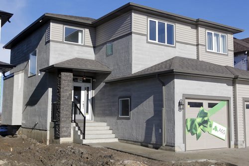 BORIS MINKEVICH / WINNIPEG FREE PRESS 140 Larry Vickar Drive West in Devonshire Village A & S Homes. Photo taken March 14, 2016