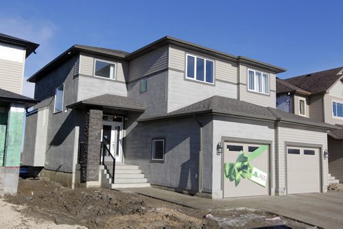 BORIS MINKEVICH / WINNIPEG FREE PRESS 140 Larry Vickar Drive West in Devonshire Village A & S Homes. Photo taken March 14, 2016