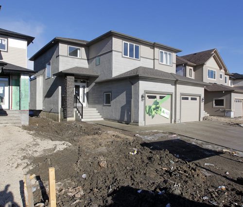 BORIS MINKEVICH / WINNIPEG FREE PRESS 140 Larry Vickar Drive West in Devonshire Village A & S Homes. Photo taken March 14, 2016