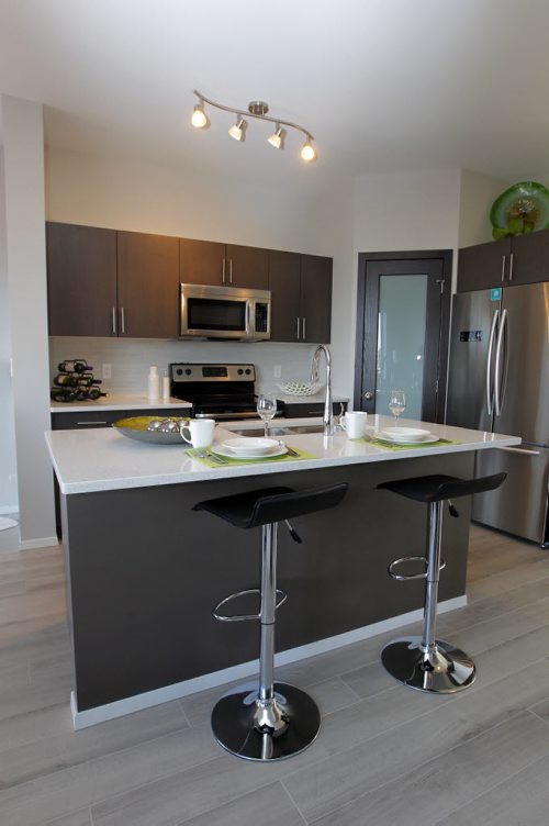 BORIS MINKEVICH / WINNIPEG FREE PRESS 140 Larry Vickar Drive West in Devonshire Village A & S Homes. Kitchen island. Photo taken March 14, 2016