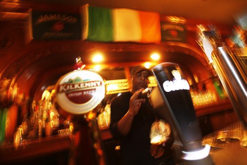 JOHN WOODS / WINNIPEG FREE PRESS Owner Gerard Fletcher pulls a pint at Shannon's Irish Pub on Carlton Monday, March 13, 2016. Re: Sanderson
