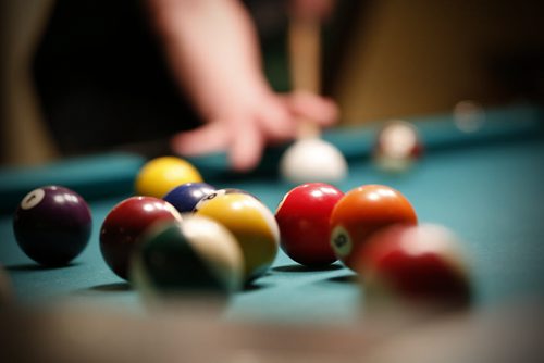 JOHN WOODS / WINNIPEG FREE PRESS Eric Legault plays pool at Shannon's Irish Pub on Carlton Monday, March 13, 2016. Re: Sanderson