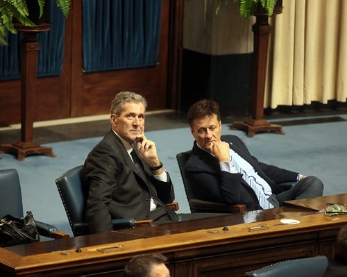 PHIL HOSSACK / WINNIPEG FREE PRESS Manitoba Conservative leader Brian Pallister looks up from a conversation with MLA Ron Shuler Tuesday as the Legislature closed it's 40th session. The election is to be called tomorrow. See stories. MARCH 15, 2016