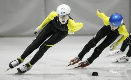 John Woods / Winnipeg Free Press / March 2, 2008- 080302  - Christopher Prendergast (230) leads Thomas Struthers (326) out of the corner in the Juvenile Male 500m final at the Manitoba Short Track Speed Skating Championships at the Pioneer Arena Sunday March 2, 2008.