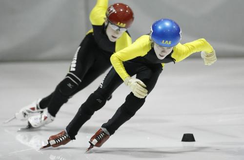 John Woods / Winnipeg Free Press / March 2, 2008- 080302  - Thomas Struthers (326) leads Owen McMahon (227) out of the corner in the Juvenile Male 500m final at the Manitoba Short Track Speed Skating Championships at the Pioneer Arena Sunday March 2, 2008.