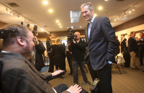 JOE BRYKSA / WINNIPEG FREE PRESS  PC leader Brian Pallister, right, meets with PC Assiniboia candidate Steven Fletcher after kicking off the 2106 election campaign at the PC candidate Mamadou Ka on Marion St in Winnipeg -  March 16, 2016.(See Larry Kusch story)