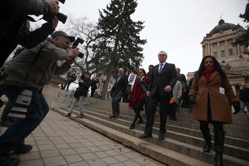 RUTH BONNEVILLE / WINNIPEG FREE PRESS  Premier Greg Selinger walks with his NDP cabinet and candidates from the Legislative Building to the Lieutenant Governor of Manitoba's Office to officially call the 2016 provincial election Wednesday.   March 16, 2016