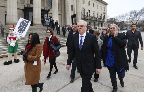 WAYNE GLOWACKI / WINNIPEG FREE PRESS  Premier Greg Selinger,centre, leads a group including NDP candidates and cabinet members from the Manitoba Legislative Bld.  to visit the Lt. Gov. of Mb. to call the 2016 provincial election. Kristin Annable  story March16 2016