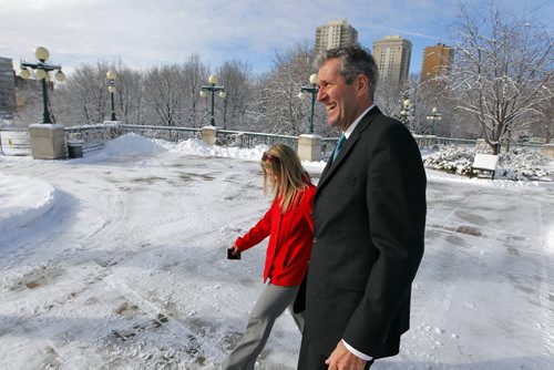 BORIS MINKEVICH / WINNIPEG FREE PRESS PC Leader Brian Pallister, right, arrives at a press conference this morning behind the leg. Photo taken March 17, 2016
