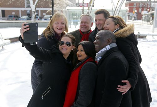 BORIS MINKEVICH / WINNIPEG FREE PRESS MB Liberal leader Rana Bokhari at a morning press conference at Osborne and Stradbrook. Announcement was about ambulances being free for seniors. Here she poses for a selfie with her liberal candidates that showed up to watch. Photo taken March 17, 2016