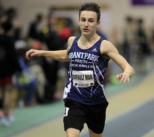 PHIL HOSSACK / WINNIPEG FREE PRESS Grant Park Pirate Mar. Dufault icrosses the finisn the mens 200 meter Thursday at Athletics Manitoba High School Track Event MARCH 17, 2016