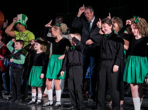 MIKE DEAL / WINNIPEG FREE PRESS PC leader Brian Pallister and fellow MLA hopefuls attended the McConnell Irish Dancers St. Patrick's Day event at the Centre Culturel Franco-Manitobain Thursday evening. They were invited to take the stage to sing 'The Unicorn Song.' 160317 - Thursday, March 17, 2016