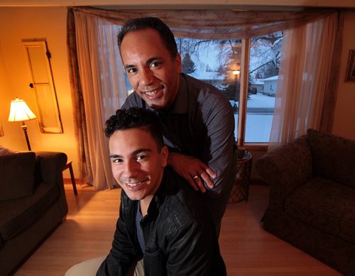 PHIL HOSSACK / WINNIPEG FREE PRESS Tim Hague Sr. and his son Tim Jr. pose Thursday at the family home. The story is about Parkinson's disease. Contacts for the photo are Tim Hague Sr. and Jr. who won the Amazing Race a couple of years ago. Tim Sr. has the disease, and his son is putting on a beer and wing relay at King's Head in early April to raise money for research.  MARCH 17, 2016