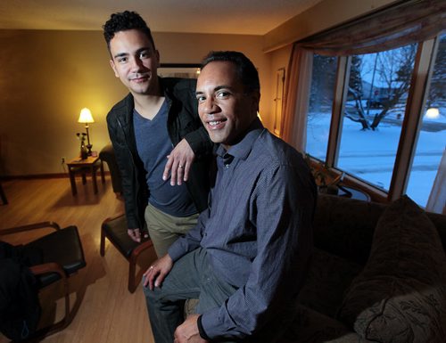 PHIL HOSSACK / WINNIPEG FREE PRESS Tim Hague Sr. (right) and his son Tim Jr. pose Thursday at the family home. The story is about Parkinson's disease. Contacts for the photo are Tim Hague Sr. and Jr. who won the Amazing Race a couple of years ago. Tim Sr. has the disease, and his son is putting on a beer and wing relay at King's Head in early April to raise money for research.  MARCH 17, 2016