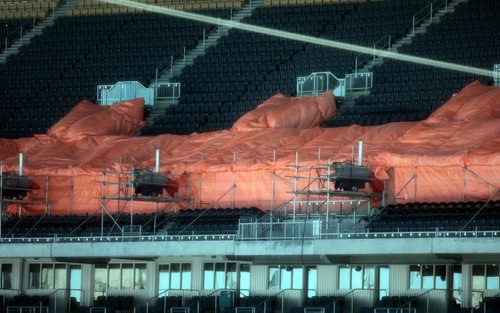 PHIL HOSSACK / WINNIPEG FREE PRESS Hoarding protects construction areas from cold as workers continue to repair the Investors Group Field stadium Friday. See story. MARCH 18, 2016