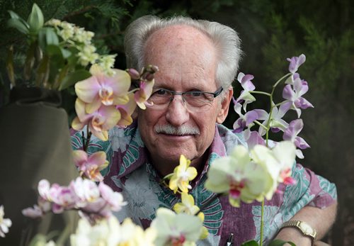 PHIL HOSSACK / WINNIPEG FREE PRESS Orchids - Dave Moran spoke with Doug Spiers Friday morning as the Annual Orchid show opened at the Assiniboine Park Conservatory. The show runs all weekend. See Doug Spiers story - STAND-UP  MARCH 18, 2016