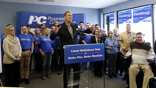 WAYNE GLOWACKI / WINNIPEG FREE PRESS  PC Leader Brian Pallister makes a health care announcement in Winnipeg Friday morning with a back drop of candidates and members of the Manitoba Paramedics Alliance.  The event took place in candidate Scott Fielding's campaign office. Larry Kusch story  March 18 2016