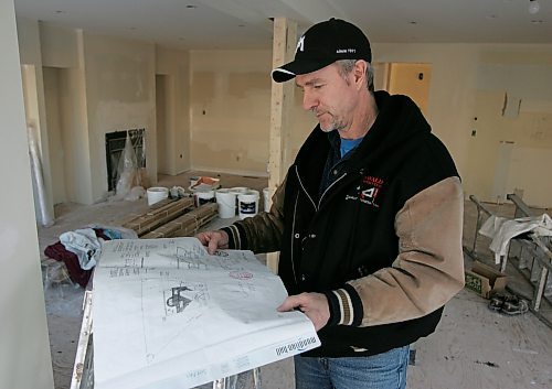 BORIS MINKEVICH / WINNIPEG FREE PRESS  080303 Ralph Oswald is a home renovator. He poses in a home that is being redone.
