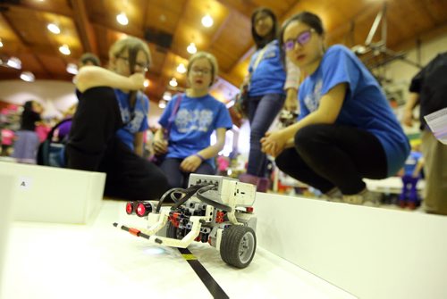 TREVOR HAGAN / WINNIPEG FREE PRESS Amy Sisson and Sydney Capan watch their robot as Amy Mittal and Rosie Deng observe during the 21st annual Manitoba Robot Games, being held at Tec-Voc High School, Saturday, March 19, 2016.