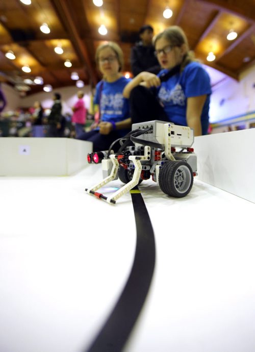 TREVOR HAGAN / WINNIPEG FREE PRESS Sydney Capan and Amy Sisson watch their robot during the 21st annual Manitoba Robot Games, being held at Tec-Voc High School, Saturday, March 19, 2016.