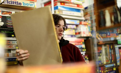 TREVOR HAGAN / WINNIPEG FREE PRESS Tanner, 16, in the Mulvey flea market booth selling games owned by his dad, Rusty , Saturday, March 19, 2016. For Dave Sanderson 49.9 story