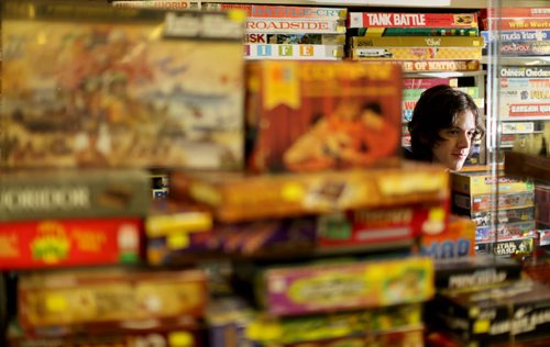 TREVOR HAGAN / WINNIPEG FREE PRESS Tanner, 16, in the Mulvey flea market booth selling games owned by his dad, Rusty , Saturday, March 19, 2016. For Dave Sanderson 49.9 story