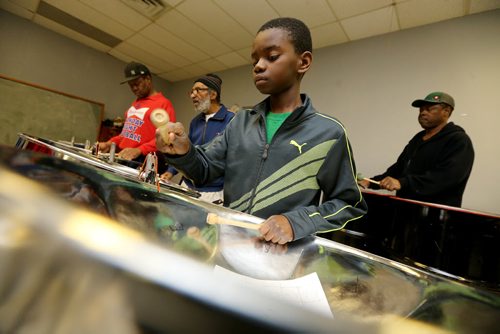 TREVOR HAGAN / WINNIPEG FREE PRESS Donnie Martin, 11, a member of Hi-Life Steel Orchestra, practicing at the Caribbean Community Cultural Centre, Saturday, March 19, 2016. For Brenda Suderman Faith page March 26