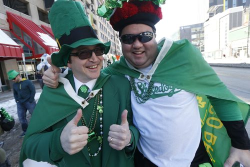 JOHN WOODS / WINNIPEG FREE PRESS Mike Boyle and Carl Osato take part in the annual St Patrick's Day Parade in Winnipeg Saturday, March 19, 2016.