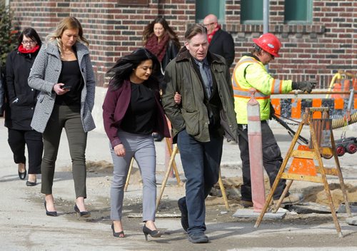 BORIS MINKEVICH / WINNIPEG FREE PRESS Manitoba Liberals to Make Infrastructure Announcement. Rana Bokhari and Mb Liberal candidate in the Assiniboia riding walk away after the presser near Broadway and Furby (Northwest Corner). Photo taken March 21th, 2016