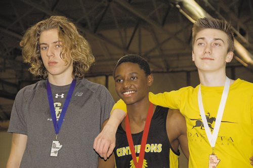 Canstar Community News Markus Rurangirwa of Fort Richmond Collegiate (centre) won the junior men's triple jump with a leap of 12.45 metres at the 2016 High School Series provincial indoor athletics championship on March 17. Michael Boguski of Garden City Collegiate (left) was second, while Nathan Dyck of Dakota Collegiate (right) finished third.