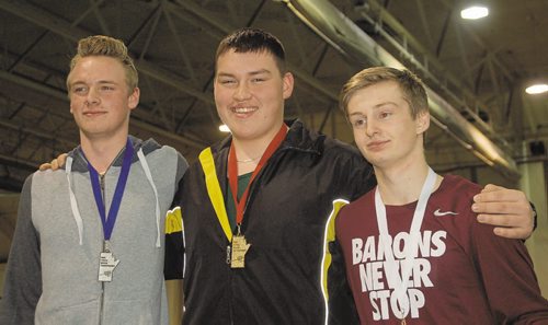 Canstar Community News Keelyn Knowles of Arborg Collegiate (centre) won the junior men's 4 kg shot put with a throw of 14.79 metres at the 2016 High School Series provincial indoor athletics championship on March 17. Nathan Harding of Arborg Collegiate (left) was second, while Michael Bachmier of St. Paul's Collegiate (right) finished third.