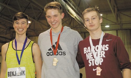 Canstar Community News Jack Taylor of St. Paul's High School (centre) won the junior men's 800 metres in a time of 2:11.14 seconds at the 2016 High School Series provincial indoor athletics championship on March 17. Michael Benjamin of Ecole Gabrielle-Roy (left) was second, while MIchael Bachmier of St. Pau's Collegiate (right) finished third.