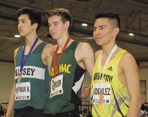 Canstar Community News Adam Naylor of Miles Macdonnell Collegiate (centre) won the senior men's 1,500 metres in a time of 4:25.60 at the 2016 High School Series provincial indoor athletics championship on March 17. Noah Hoffman of Vincent Massey Collegiate (left) was second, while Fernando Gonzalez of Garden City Collegiate (right) finished third.
