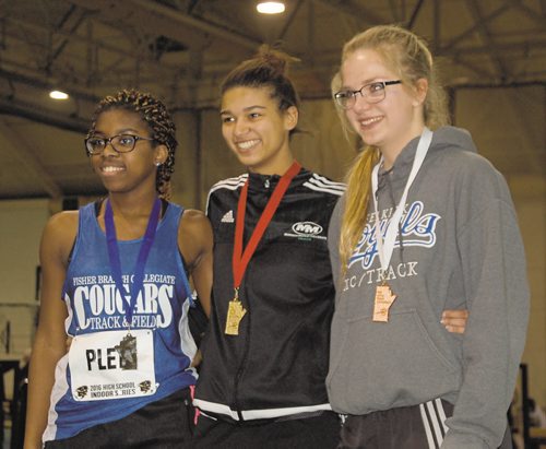 Canstar Community News Rebekah Eckert of Murdoch MacKay Collegiate (centre) won the senior women's long jump with a leap of 5.72 metres at the 2016 High School Series provincial indoor athletics championship on March 17. Richelande Plette of Fisher Branch Collegiate (left) was second, while Amy Wiebe of Lord Selkirk Regional Secondary School (right) finished third.