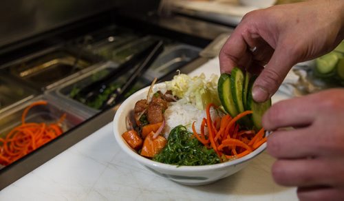 MIKE DEAL / WINNIPEG FREE PRESS Chosabi Asian Eatery 100A King Street Preparation of a Poké Bowl. 160321 - Monday, March 21, 2016