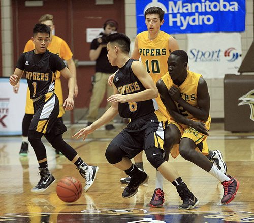 PHIL HOSSACK / WINNIPEG FREE PRESS Garden City Gopher's #6 Dylan Tagle works past John Taylor Piper #2 Luois Makot during the MHSAA Basketball Champioship final Monday at Investor's Group Athletic Center.  MARCH 21, 2016
