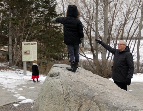 BORIS MINKEVICH / WINNIPEG FREE PRESS NDP Leader Greg Selinger, right, with 6 year old Adam Stewart-Boulay standing on rock at Fort Whyte Alive. Adam's little sister Violet in the background. Photo taken March 22th, 2016