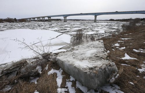 WAYNE GLOWACKI / WINNIPEG FREE PRESS     Ice build up on the Red River by the Howard Pawley Bridge Tuesday. The bridge is north of Selkirk. Mb. for the  #4 highway.  March 22 2016