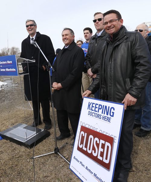 WAYNE GLOWACKI / WINNIPEG FREE PRESS     From left, PC Leader Brian Pallister and candidates Dr. Alan Lagimodiere, Selkirk,  and Jeff Wharton, Gimli, holding the sign makes an announcement Tuesday on how a new Progressive Conservative government will act to improve recruitment and retention of doctors.  The event was held in front of the Selkirk & District General Hospital .¤Kristin Annable  story  March 22 2016